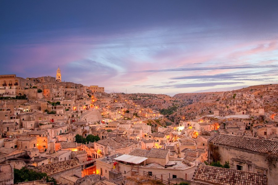 Sassi di Matera at dusk with warm lights