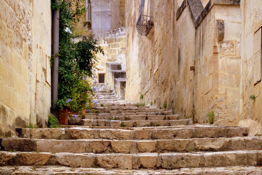 Stone stairs leading up through the Sassi